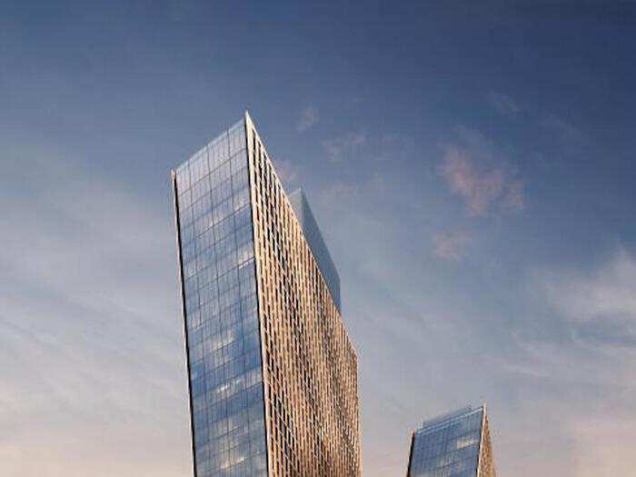 This rendering shows the expected reflective quality of the towers once they