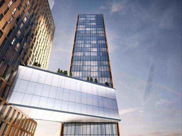 A rendering shows the completed skybridge between the two towers.