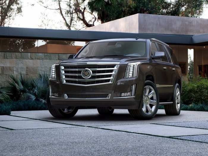 Consumers began trending toward big SUVs, like the Cadillac Escalade or ...