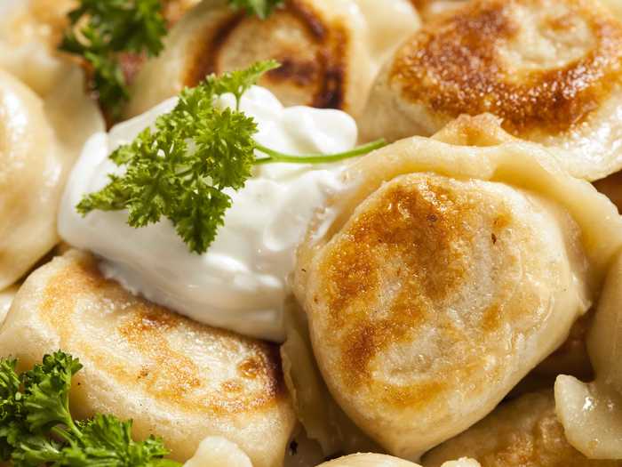 Pierogi is the national dish of Poland, though it is common in other Eastern European countries. The farmers cheese pierogi is a classic: semi-circular dumplings stuffed with cheese. Other variations are stuffed with potatoes, fried onions, or meat.