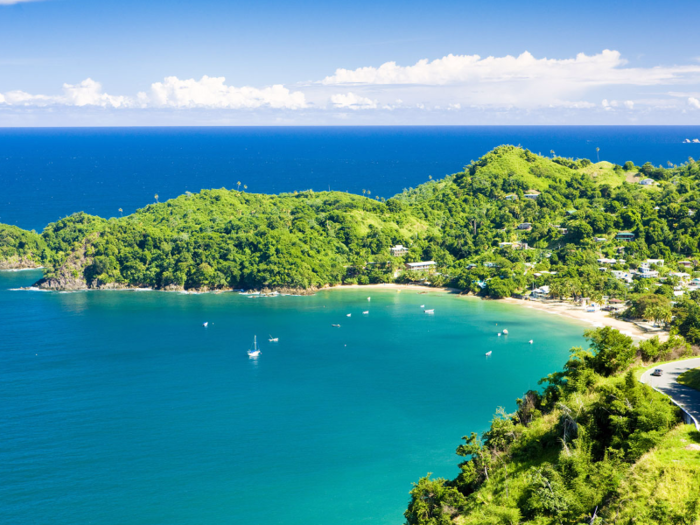 Head to Castara Bay, a serene fishing village in Trinidad and Tobago, to enjoy swimming and snorkeling along its tranquil beaches. You