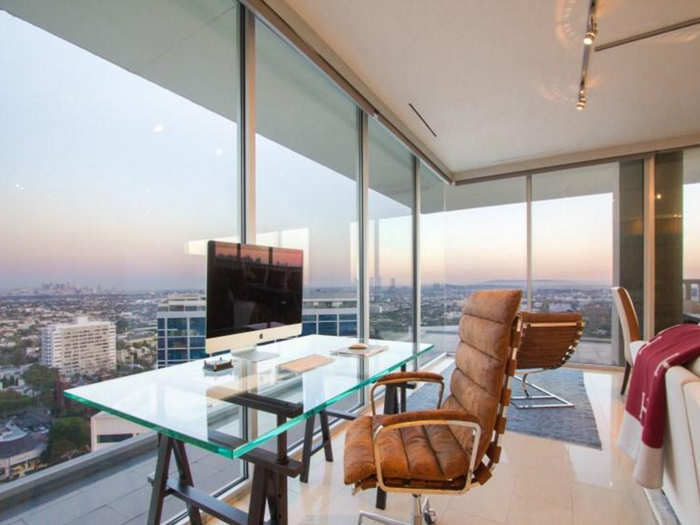 Floor-to-ceiling glass makes for a prime office perch.