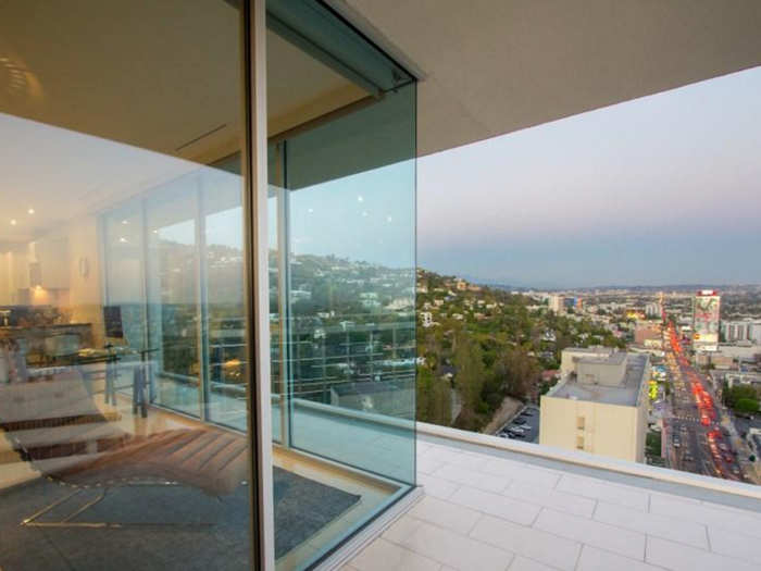 A terrace expands off of the condo.