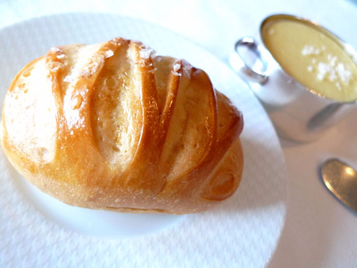 Various bread selections are available from Bouchon Bakery. Pictured here is a pain au lait served with unsalted goat