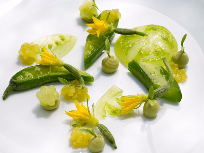 The restaurant also offers a vegetarian tasting menu for $310 per person, which gives you dishes like this mix of compressed garden cucumbers, preserved green tomatoes, and Brokaw avocado mousse.