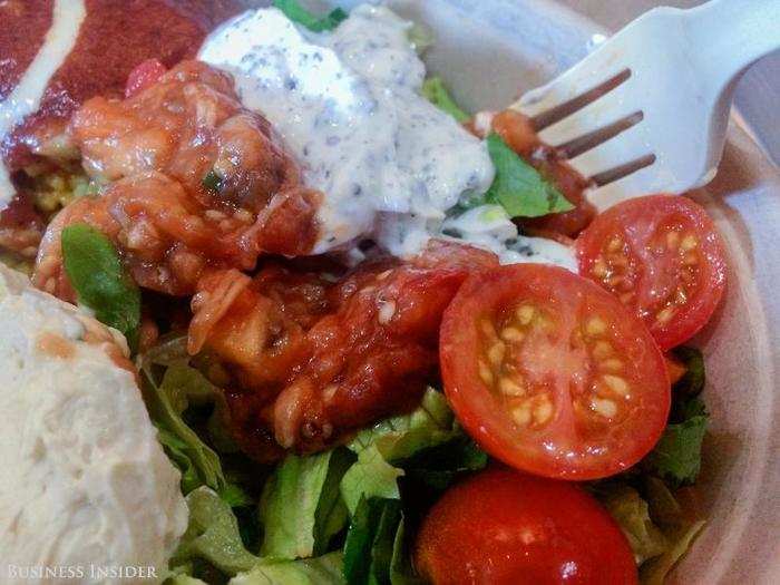 On the side, a heaping dollop of creamy hummus, minted yogurt, plump cherry tomatoes, and a sweet and sour eggplant relish of sorts all on top of a few tufts of romaine lettuce. Despite being only a small side addition to the meatballs, it