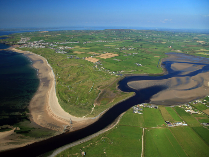 Located in County Kerry, Ireland, The Old Course at Ballybunion is naturally beautiful, with grassy dunes set alongside the ocean. Nearly every hole here is excellent.