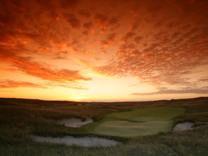 The course at Sand Hills in Mullen, Nebraska, was dubbed “the most natural golf course in America” by Golf Digest. The links-style course includes 19 holes that emerge from rolling sand hills, with challenging holes shaped by natural sand traps.