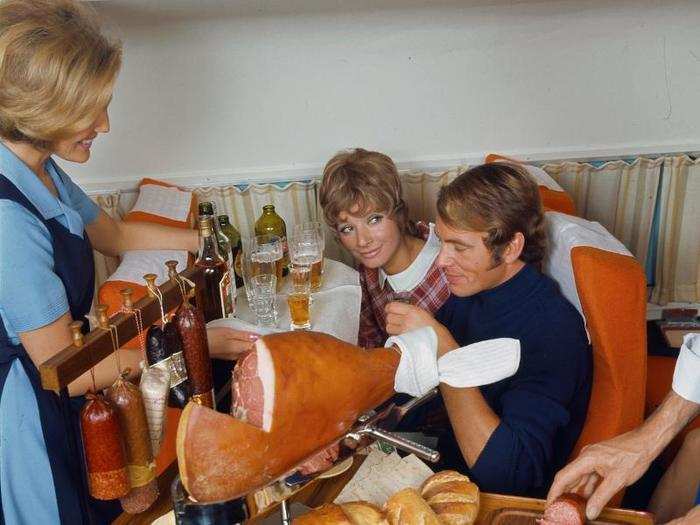 That same year, passengers in first-class were treated to a hearty meat feast that included an entire leg of ham, salami, and other sausages served with bread and beer.