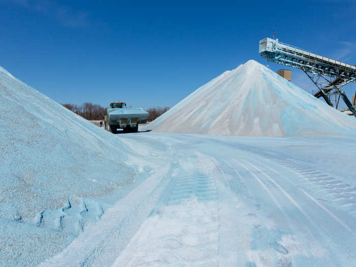 As part of the tour, Rhodes got to explore what goes on above ground, including the huge piles of salt that lie there. Rock salt, which is used to melt snow and ice on roads, is often dyed blue so that it stands out when it