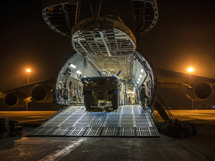 More than 266,000 pounds of cargo and armored vehicles are seen loaded into the C-5 in Afghanistan.