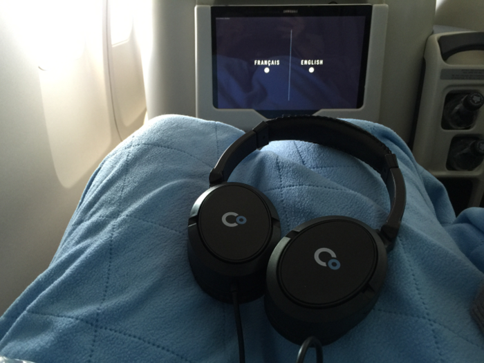 Next they handed out comfortable noise-canceling headphones. Sadly, these had to be returned at the end of the flight, but it was nice to have them for the seven hours we were on board.