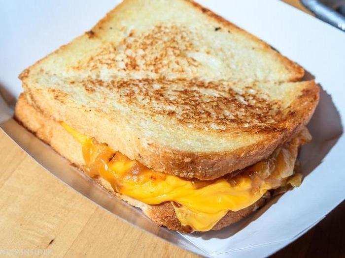 The classic grilled cheese is a simple, lovable sandwich: American cheese on toasted, buttery white bread, for $5.05. Hard to mess up, but hard to stand out amongst the cheesy, madding crowd.