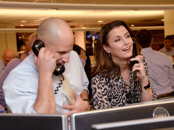 Actress Bridget Moynahan takes calls.