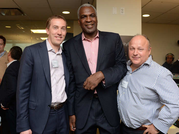 Former basketball pro Charles Oakley posed with BTIG staff.