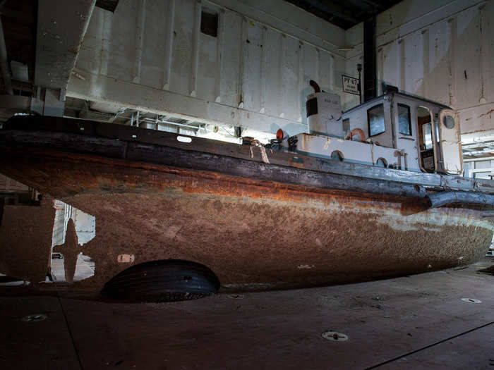 Much of the fleet that Heiden photographed has already been scrapped. This attack cargo ship, the USS Tulare, was held inside a larger mining barge in the fleet until 2012, when it was sent to be dismantled.