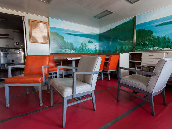 A meeting room on the USS Northern Light, complete with a large nature mural, of all things. The boat joined the Suisun Bay Reserve fleet in 1991.