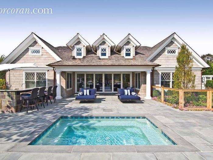 An underground hot tub sits out back.