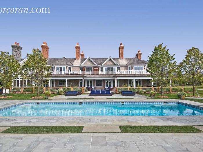 The main house sits close to the 60-foot by 20-foot heated pool, which has an underwater speaker system.