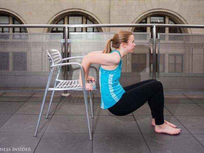 While down, keep your elbows back and close to your sides, not spread out to the left and right. Repeat these chair push-ups, increasing the amount you do every time.