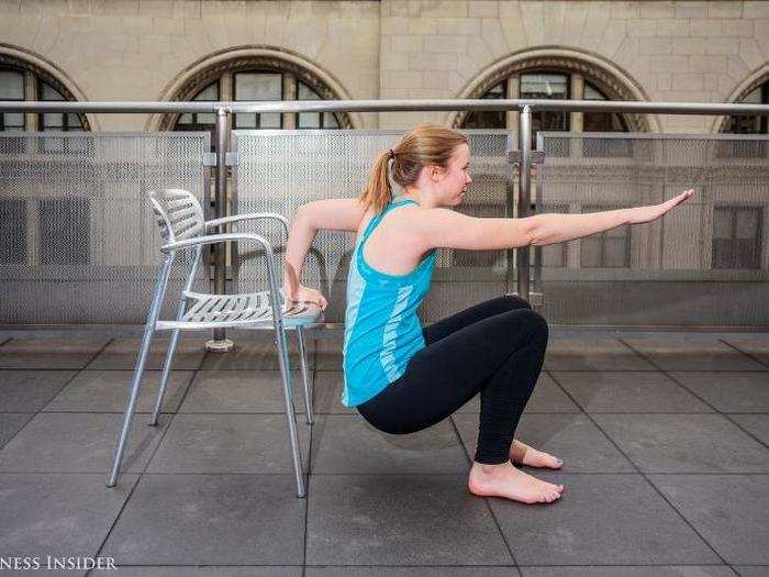 Modification #2: If you really want to push your arms to the extreme, place one hand on the chair and hold the other out in front of you. Repeat with the other arm.