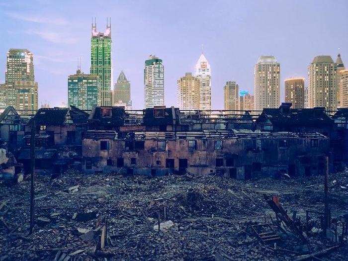 Little said he wanted to "avoid the cliché, villain, fat-cat banker." "What I loved about this image is how powerfully it caught the adjacency of wealth and poverty, beauty and ruin," Little said of this picture of Shanghai.