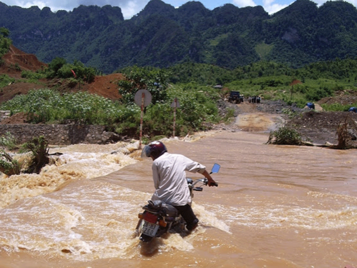 Here, the water had completely washed out the road. As you can see it was pretty deep. We crossed carefully so our engines wouldn