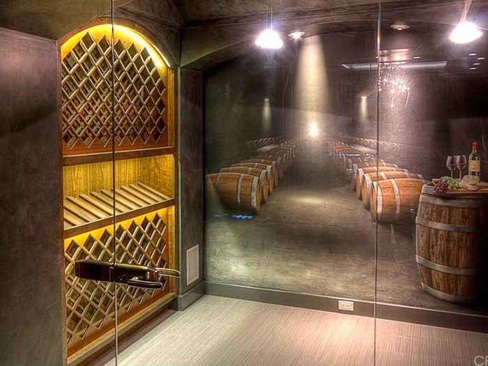 The wine cellar features a very meta mural of a wine cellar.