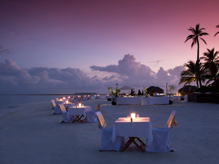 The Conrad Maldives Rangali Island sits surrounded by the Indian Ocean in the Maldives. Guests who are transported here via seaplane can indulge in experiences like swimming with whale sharks or dining at the hotel