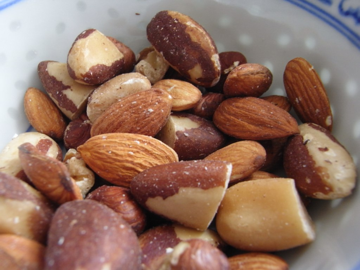 Almonds are another sleep-inducing nut. They are rich in tryptophan and magnesium, which help to naturally reduce muscle and nerve function in addition to steadying your heart rhythm.