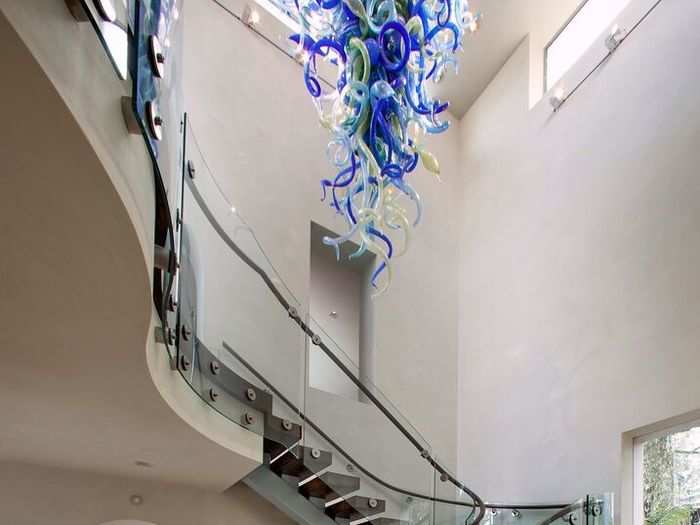 Inside is a large glass sculpture by American glass sculptor Dale Chihuly. It hangs elegantly in the entrance.