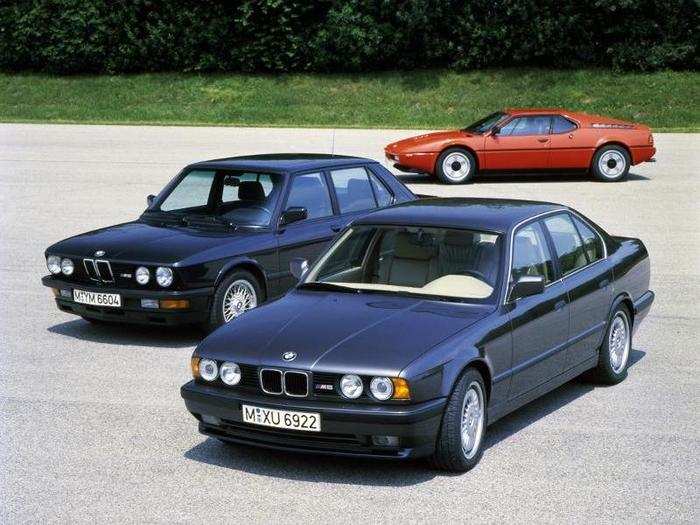 In 1986, BMW put the engine from the M1 into their E28 5 Series sedan (left). Thus the "M" car — and the entire concept of the "businessman