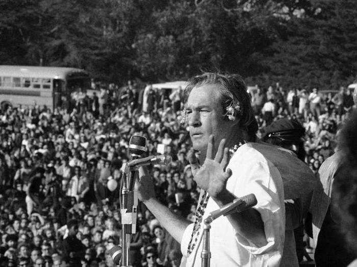 Timothy Leary, the former Harvard professor and LSD guru, spoke to the crowd, telling them to "Tune In, turn on, and drop out."