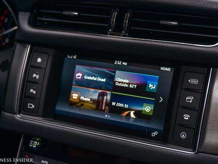 Even with the buttons, the center stack it is still dominated by an 8-inch capacitive touchscreen running Jag