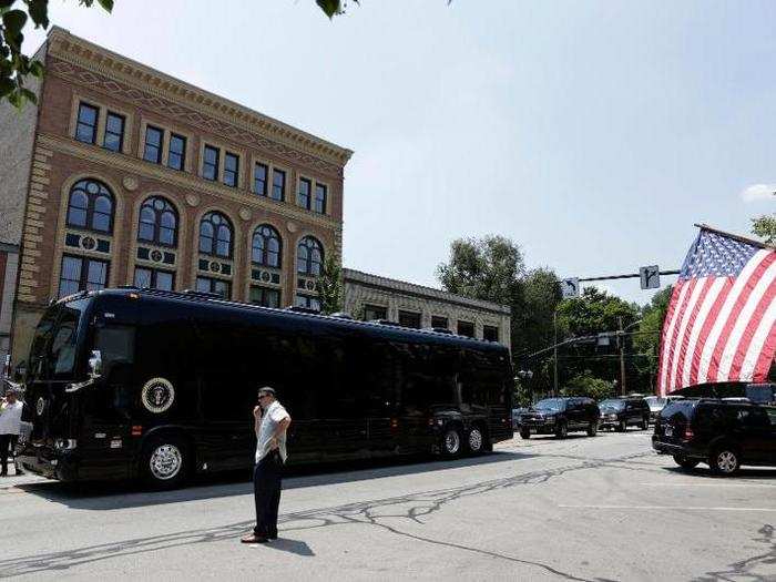 In addition to the security features, the bus comes equipped with a full suite of office equipment including phones, television, radio, and internet.