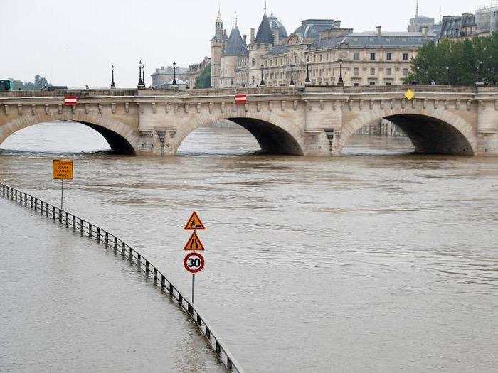 The Seine is bleeding onto roads, resembling a giant infinity pool.