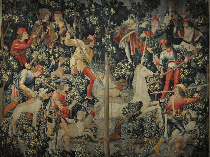 "The Unicorn is Attacked" (from the Unicorn Tapestries in the Cloisters).