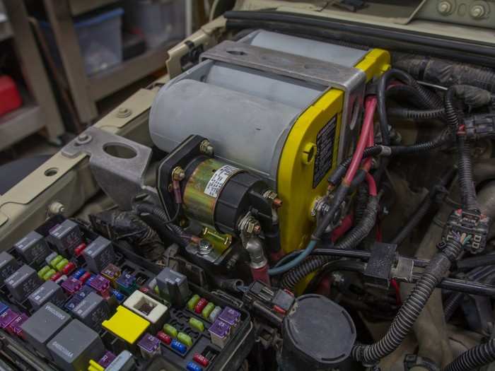 I installed dual isolated Optima Yellow top batteries. This way the one that starts the engine is separate from the one running the fridge and everything else — so even if it goes dead, the engine will still start. The isolator joins them when the engine is running, so the alternator charges both.