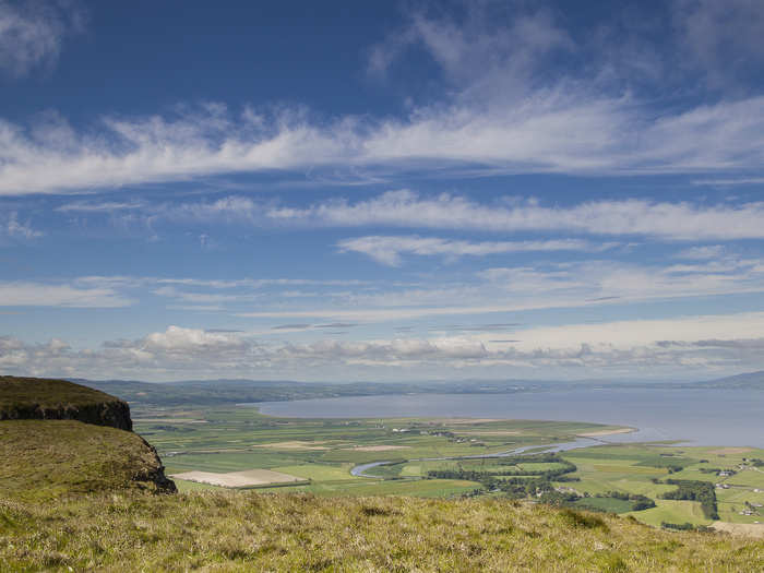 This plateau in Northern Ireland is called Binevenagh. The views from the cliff side are stunning.