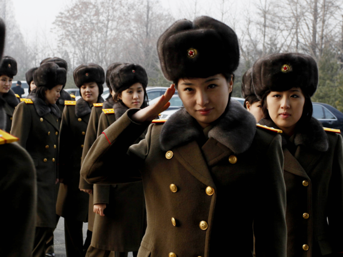 Each of the roughly 20 members is ranked highly in the North Korean military. The band often performs in slightly altered military outfits.