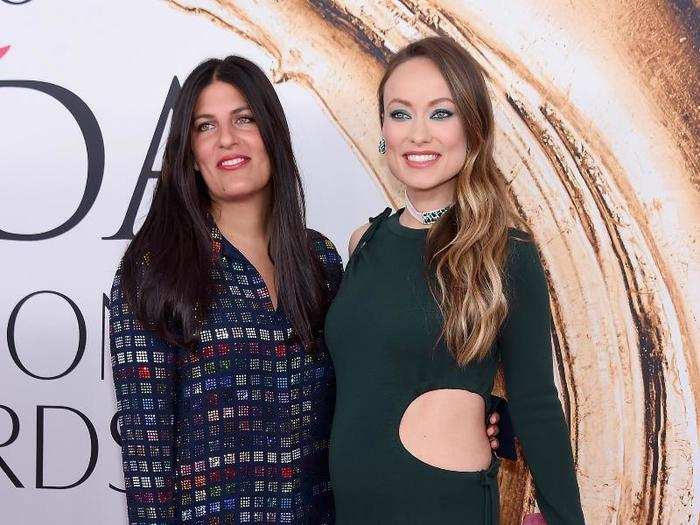 Pregnant Olivia Wilde showed off her curves with designer Rosie Assoulin.