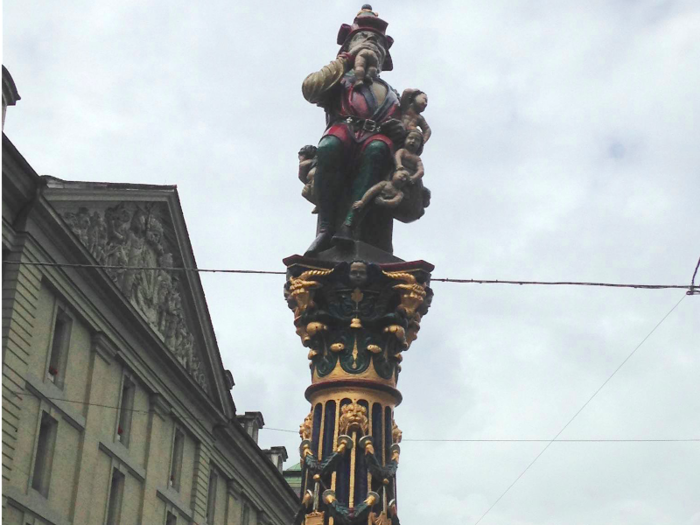 And lastly, this "creepy, yet hilarious" statue of a man eating babies near the landmark Zytglogge tower in Bern.