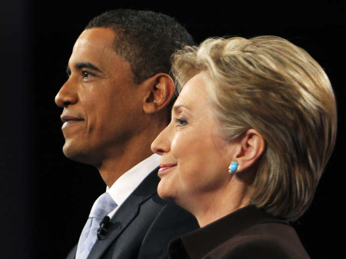 Then US Democratic presidential candidates Barack Obama and Hillary Clinton pose for photographers prior to the CNN/Los Angeles Times Democratic presidential debate in Hollywood, California January 31, 2008.