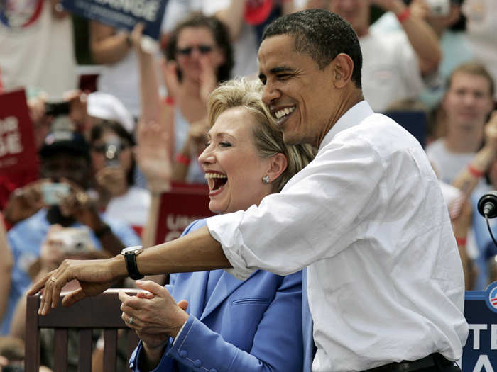 Barack Obama and Senator Hillary Clinton react to the crowd as she endorses Obama in person and campaigns with him for the first time in the town of Unity, New Hampshire, June 27, 2008.