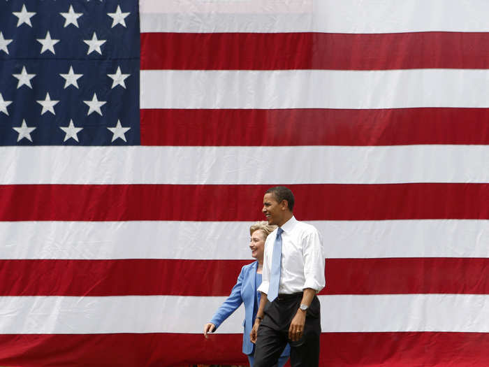 Barack Obama and Hillary Clinton enter their campaign event in the town of Unity, New Hampshire, June 27, 2008.