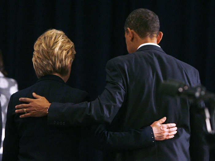 Hillary Clinton leaves a news conference arm-in-arm with then President-elect Barack Obama after being announced as his choice for US Secretary of State in Chicago December 1, 2008.