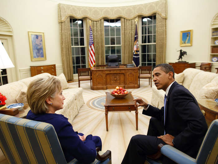 President Barack Obama talks with Secretary of State Hillary Rodham Clinton shortly after she was confirmed and sworn, in the Oval Office of the White House on January 21, 2009.