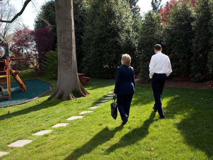 President Barack Obama walks with Secretary of State Hillary Rodham Clinton outside the Oval Office following their meeting April 9, 2009.