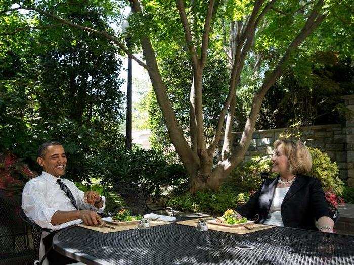 President Barack Obama has lunch with former Secretary of State Hillary Rodham Clinton on the patio outside the Oval Office, July 29, 2013.