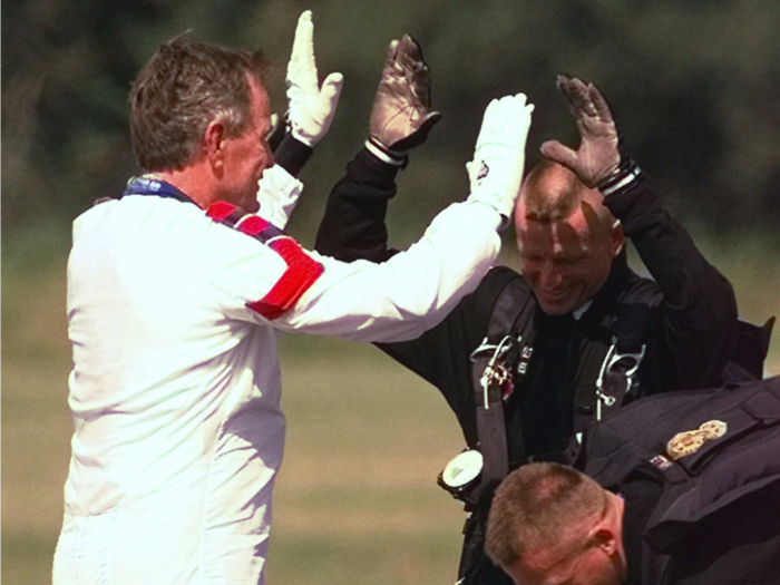 He jumped solo and landed near his presidential library and museum in College Station, Texas.